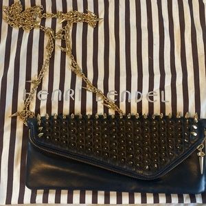 Henri Bendel black and gold studded clutch. Used less than 5 times.